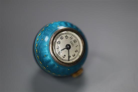 A white metal and guilloche enamelled Ebel manual wind globe pendant watch, with Arabic dial, 20mm.